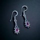 Aretes con Rubí natural en plata 925