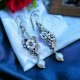 Aretes flores con Perla en plata 925