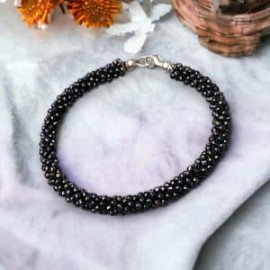 Pulsera tejida con Espinela negra en plata 925